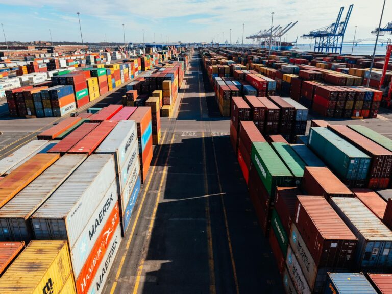 Vibrant aerial shot of a bustling container yard at Baltimore port showcasing logistics and commerce.